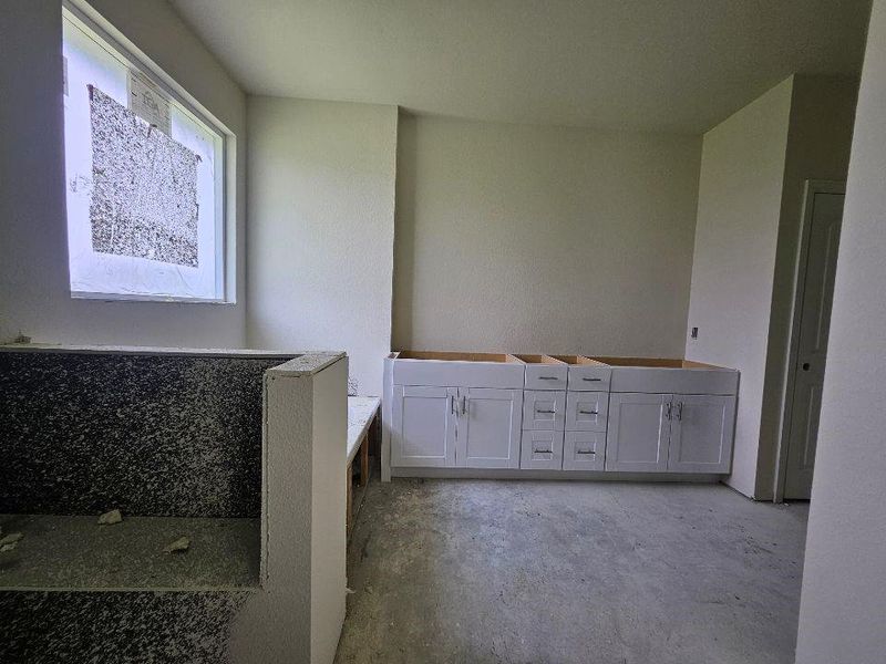In-progress construction of a new home in The Hollow, Ennis, TX (Image 11).