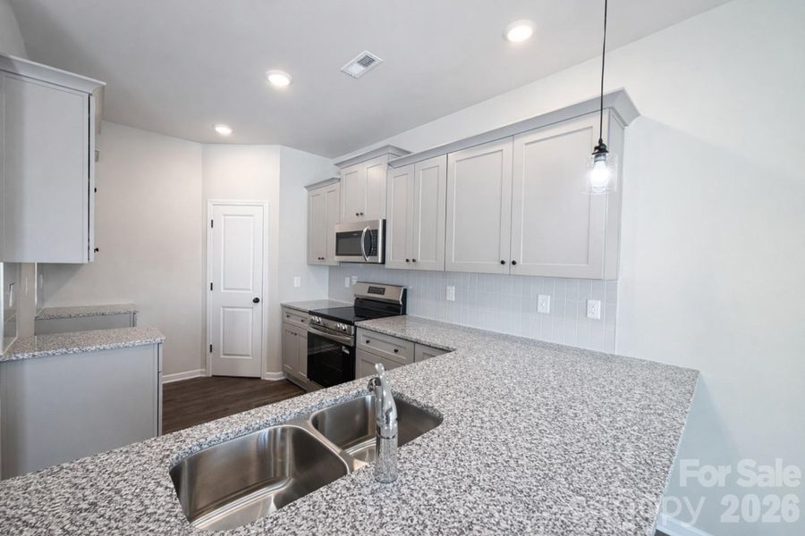 Furnished interior view inside a new home in , Charlotte (Image 11). Furnished interior view inside a new home in , Charlotte (Image 11).