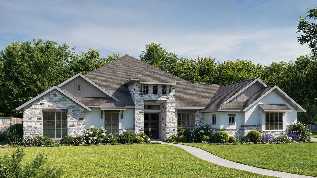 Representative exterior photo of a completed home built from the 3602A by Perry Homes in Johnson Ranch Half Acre, Bulverde, TX (Image 1).