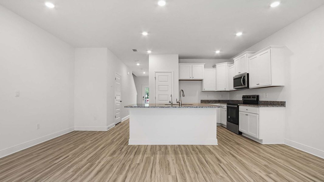 Furnished interior view inside a new home in Hawks Landing Townhomes, Santa Rosa Beach (Image 8).