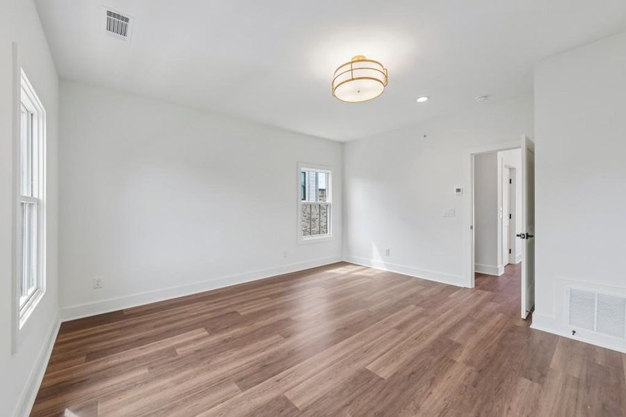 Spacious, unfurnished interior of a new home in Skyview On Broad, Sugar Hill (Image 28). Spacious, unfurnished interior of a new home in Skyview On Broad, Sugar Hill (Image 28).