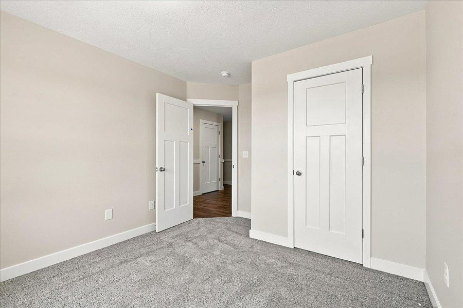 Spacious, unfurnished interior of a new home in Davis Heights, Inman (Image 21).