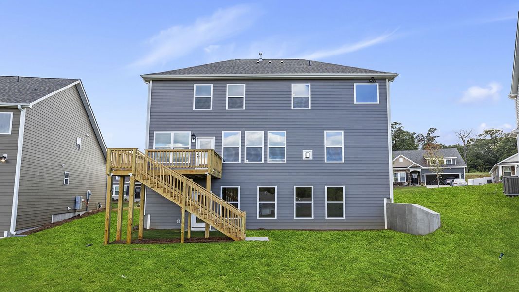 Front exterior of a new home in Whitehawk Meadows, Travelers Rest, SC, highlighting curb appeal (Image 22). Front exterior of a new home in Whitehawk Meadows, Travelers Rest, SC, highlighting curb appeal (Image 22).