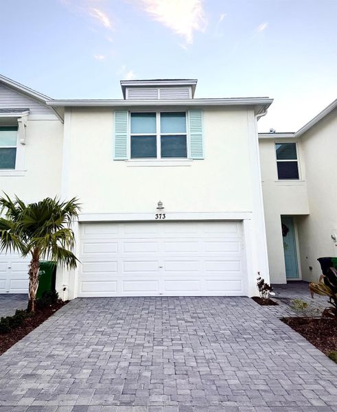 Front exterior of a new home in , Fort Pierce, FL, highlighting curb appeal (Image 1). Front exterior of a new home in , Fort Pierce, FL, highlighting curb appeal (Image 1).