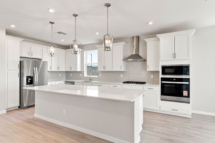 Furnished interior view inside a new home in Marbella at Windrose, Waddell (Image 8).