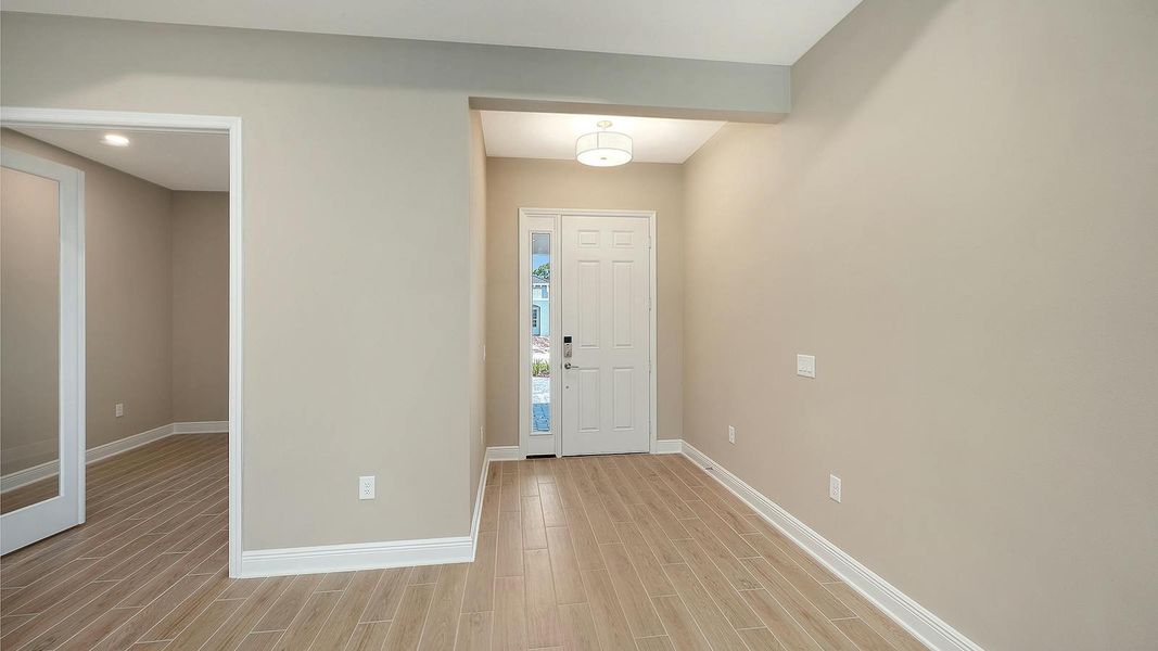 Spacious, unfurnished interior of a new home in Grand Park Real Estate and Homes for Sale in Sarasota, FL - Neal Communities, Sarasota (Image 18). Spacious, unfurnished interior of a new home in Grand Park Real Estate and Homes for Sale in Sarasota, FL - Neal Communities, Sarasota (Image 18).