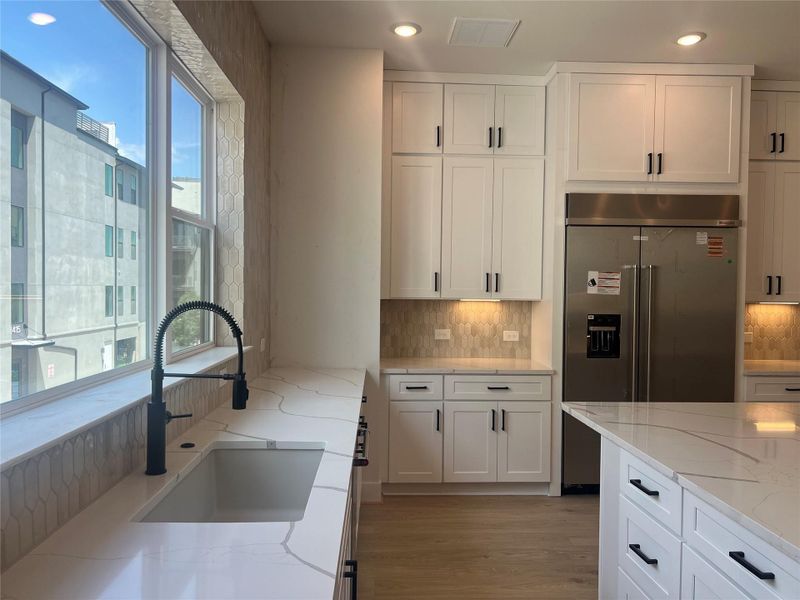 Furnished interior view inside a new home in The Grove, Austin (Image 10).