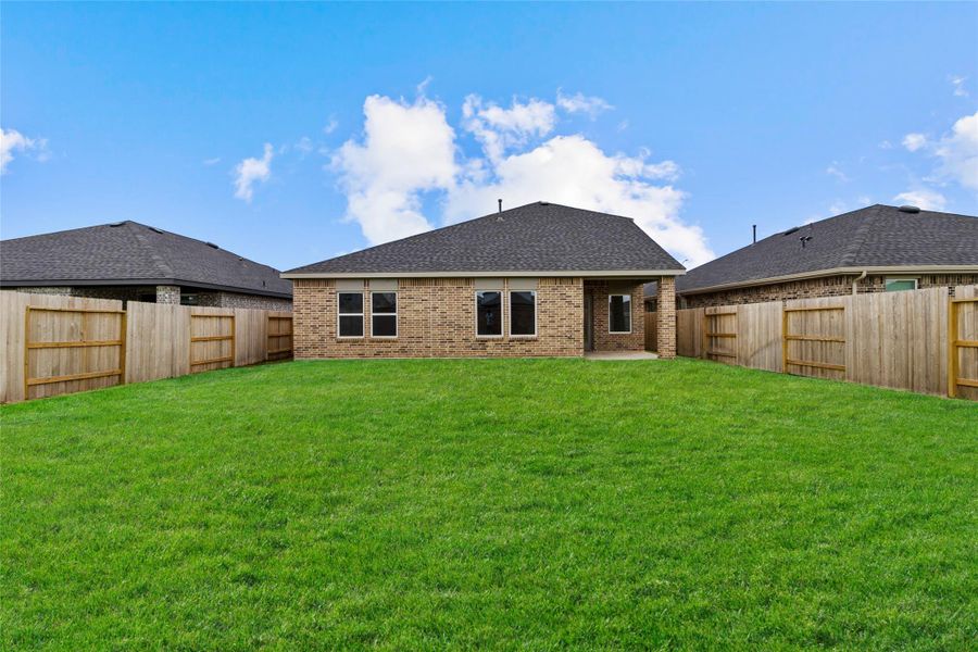 Exterior details and patio area of a home in Sunterra, Katy (Image 3). Exterior details and patio area of a home in Sunterra, Katy (Image 3).
