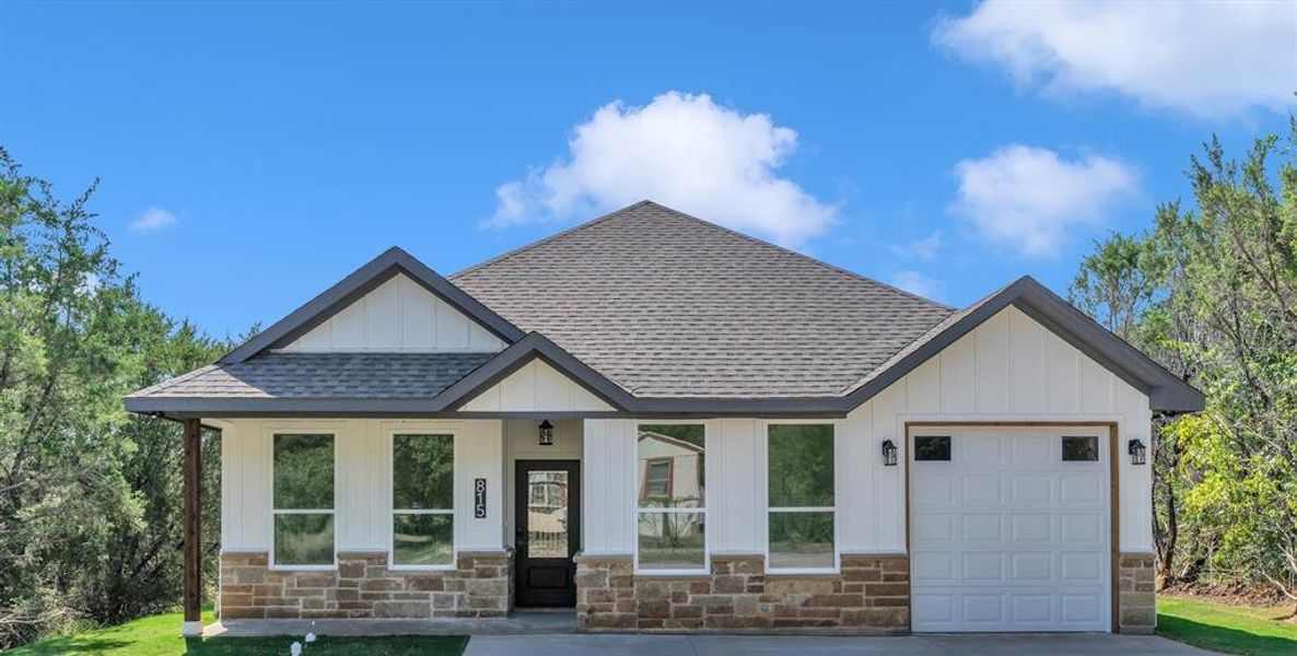 Front exterior of a new home in , Granbury, TX, highlighting curb appeal (Image 15). Front exterior of a new home in , Granbury, TX, highlighting curb appeal (Image 15).