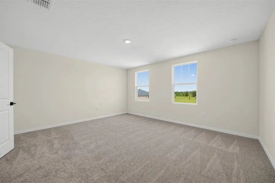 Spacious, unfurnished interior of a new home in Trailside, Mount Dora (Image 24).