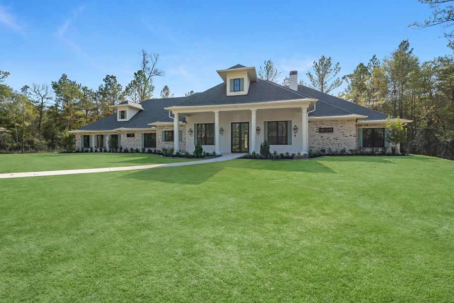 Beautiful front exterior showcasing a well-maintained façade with attractive architectural details and inviting curb appeal. Beautiful front exterior showcasing a well-maintained façade with attractive architectural details and inviting curb appeal.