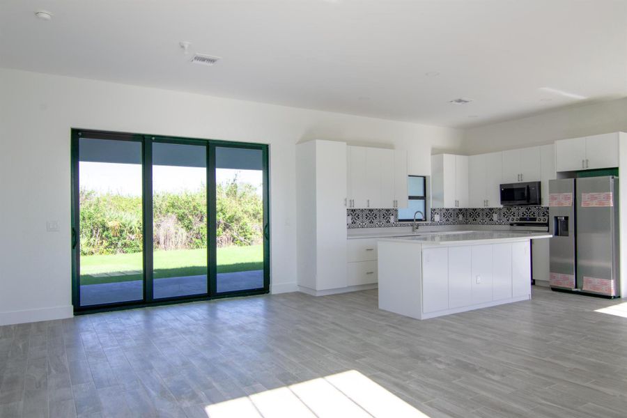 Spacious, unfurnished interior of a new home in , Port Charlotte (Image 22).