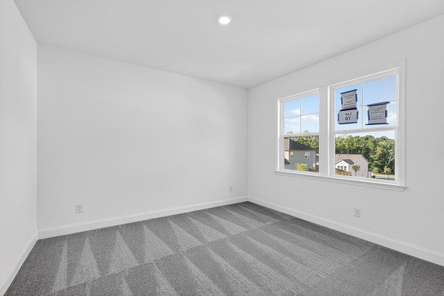 Spacious, unfurnished interior of a new home in Bailey Fence, Dacula (Image 39).