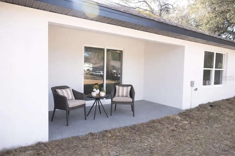 Exterior details and patio area of a home in , Ocala (Image 4).