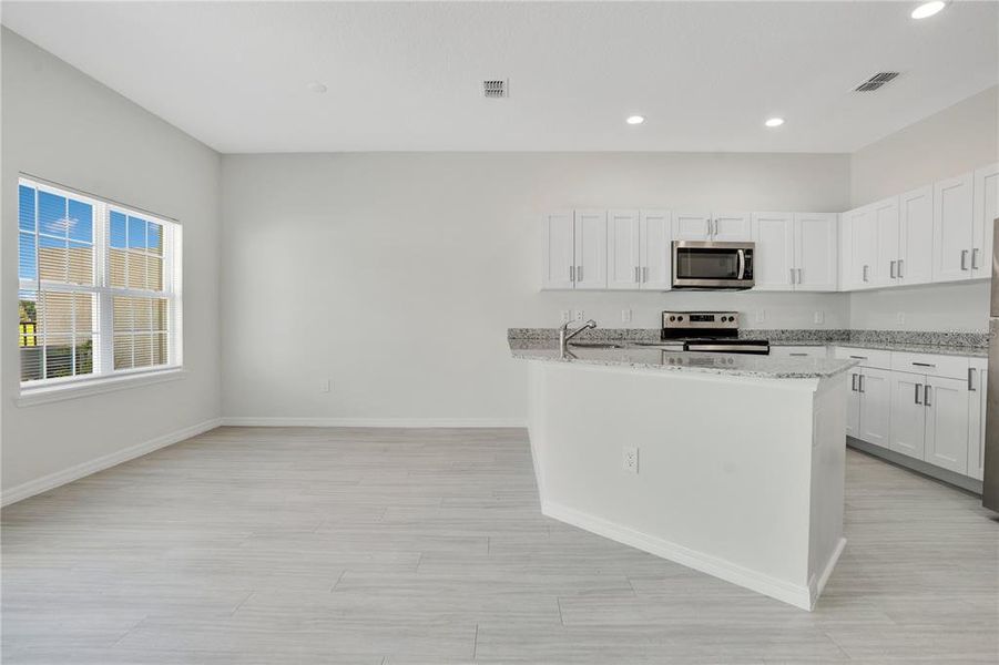 Furnished interior view inside a new home in , Kissimmee (Image 12). Furnished interior view inside a new home in , Kissimmee (Image 12).