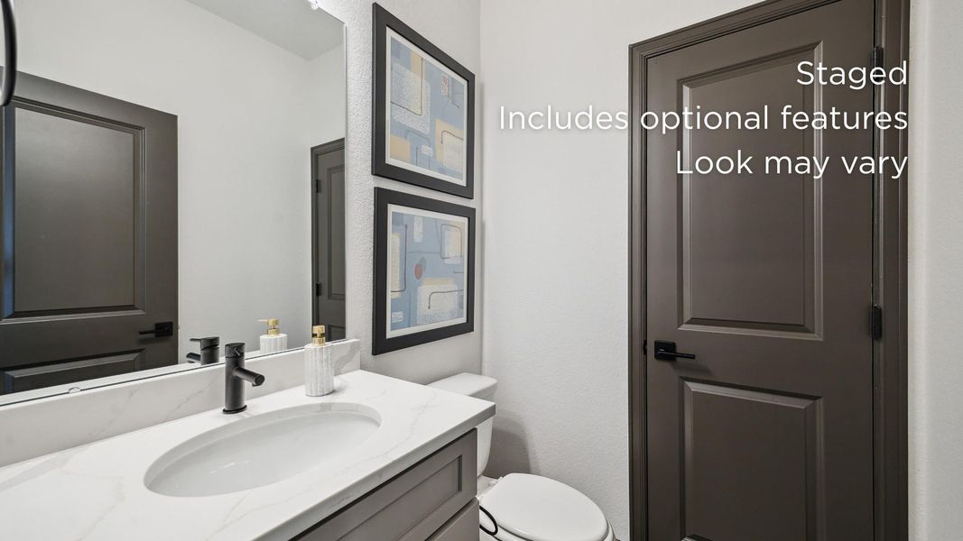 Furnished interior view inside a new home in The Grand Prairie 60', Hockley (Image 14).