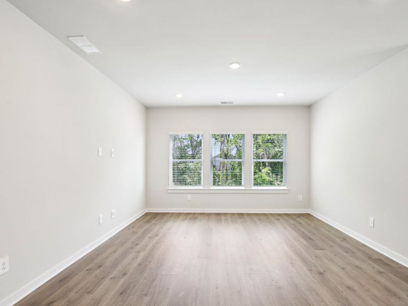 Living room in the Sherwood floorplan in a Meritage Homes community. Living room in the Sherwood floorplan in a Meritage Homes community.