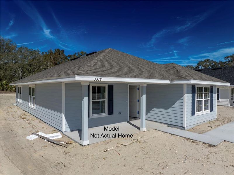 Front exterior of a new home in Rolling Hills, Bell, FL, highlighting curb appeal (Image 2).