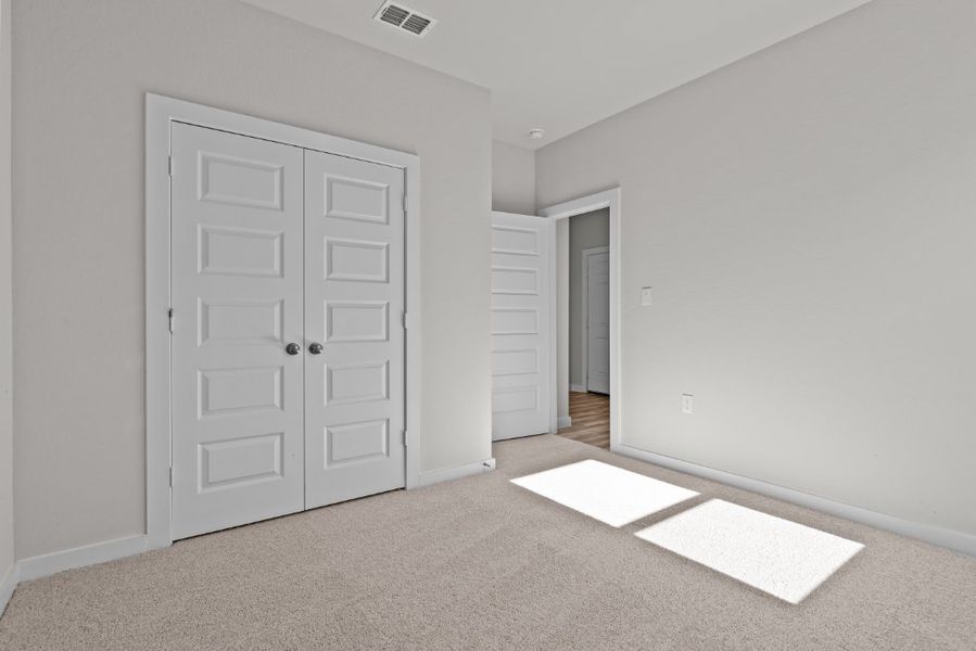 A room with white doors.