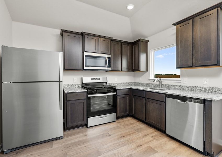 The kitchen has stainless-steel appliances. The kitchen has stainless-steel appliances.