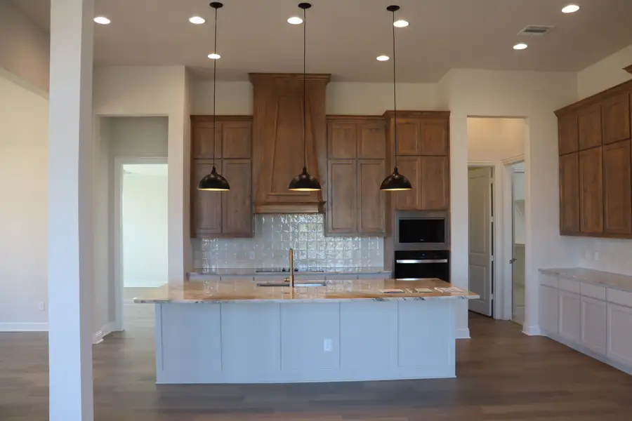 Furnished interior view inside a new home in Bull Hide Estates, Hewitt (Image 5).