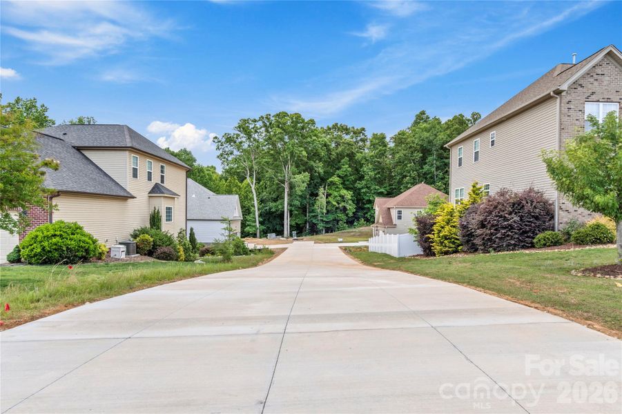 Front exterior of a new home in , Winston-Salem, NC, highlighting curb appeal (Image 21).