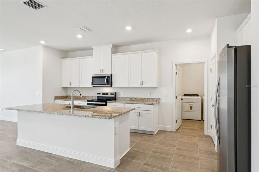 Furnished interior view inside a new home in Cyrene at Minneola - Villas, Minneola (Image 11).