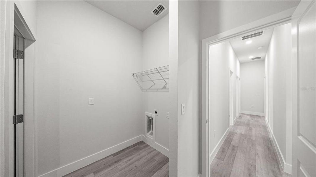 Spacious, unfurnished interior of a new home in , Port Charlotte (Image 23).