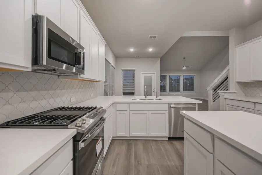 Representative furnished interior of a home built from the Brandy by Chesmar Homes in Buffalo Crossing, Cibolo (Image 26).