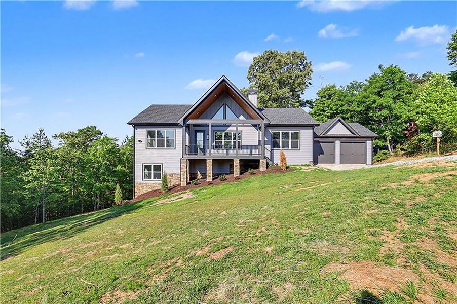 Front exterior of a new home in , Morganton, GA, highlighting curb appeal (Image 29). Front exterior of a new home in , Morganton, GA, highlighting curb appeal (Image 29).