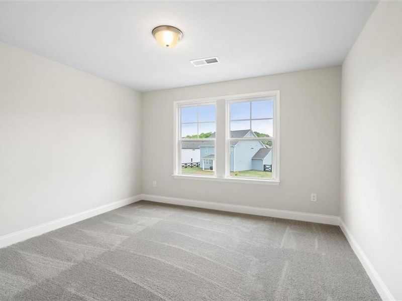 Spacious, unfurnished interior of a new home in Wehunt Meadows, Hoschton (Image 32).