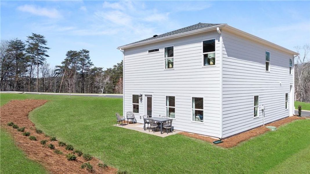 Exterior details and patio area of a home in The Bluffs, Canton (Image 3).