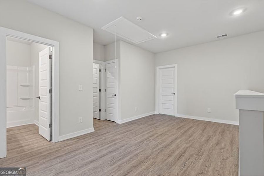 Spacious, unfurnished interior of a new home in The Park at Gainesville Township, Gainesville (Image 13).