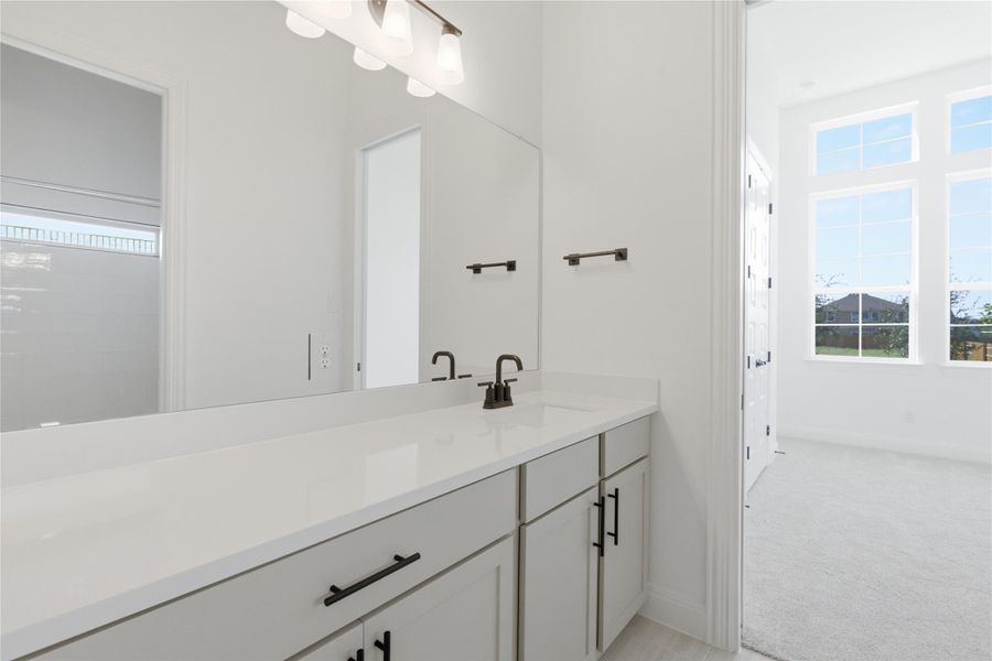 Furnished interior view inside a new home in Oaks at San Gabriel, Georgetown (Image 6).