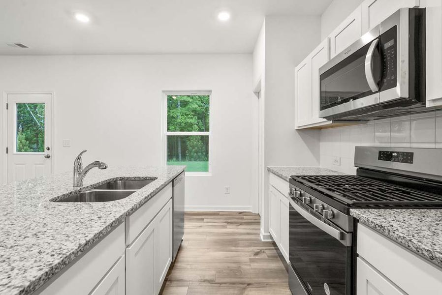 Representative furnished interior of a home built from the Baker by Ashton Woods in Langston Reserve, Cartersville (Image 13).