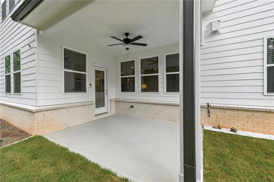 Exterior details and patio area of a home in Bailey Fence, Dacula (Image 24).