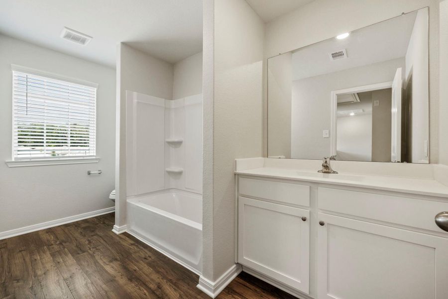 Secondary Bathroom comes with a shower and tub combo
