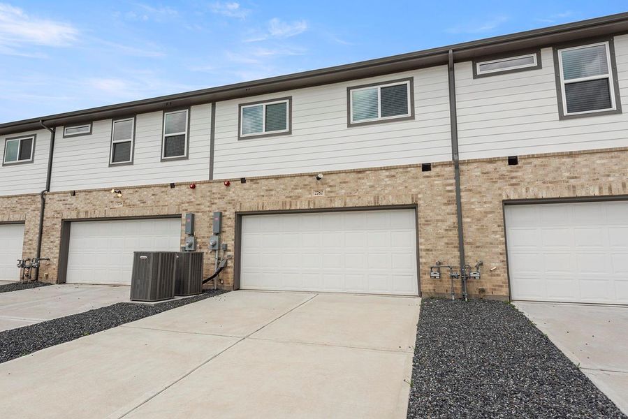 Exterior details and patio area of a home in Sierra Vista Townhomes, Rosharon (Image 2). Exterior details and patio area of a home in Sierra Vista Townhomes, Rosharon (Image 2).