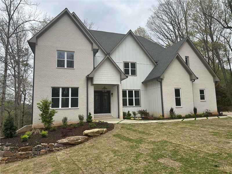 Front exterior of a new home in , Atlanta, GA, highlighting curb appeal (Image 24). Front exterior of a new home in , Atlanta, GA, highlighting curb appeal (Image 24).
