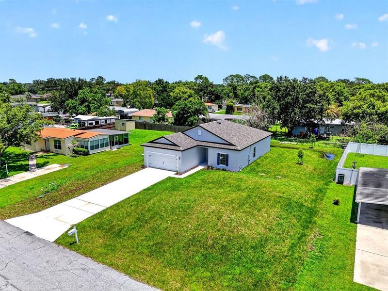 Front exterior of a new home in , Deltona, FL, highlighting curb appeal (Image 1). Front exterior of a new home in , Deltona, FL, highlighting curb appeal (Image 1).