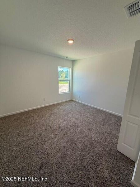 Spacious, unfurnished interior of a new home in Grand Reserve, Bunnell (Image 24).