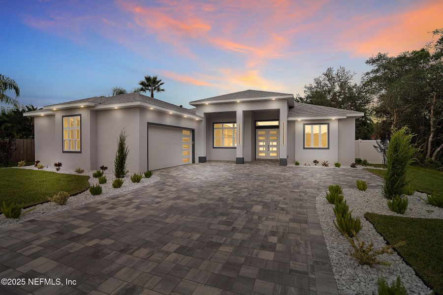 Front exterior of a new home in , Palm Coast, FL, highlighting curb appeal (Image 30). Front exterior of a new home in , Palm Coast, FL, highlighting curb appeal (Image 30).