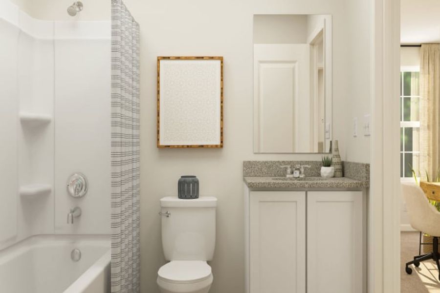 A bathroom with a sink toilet and bathtub.