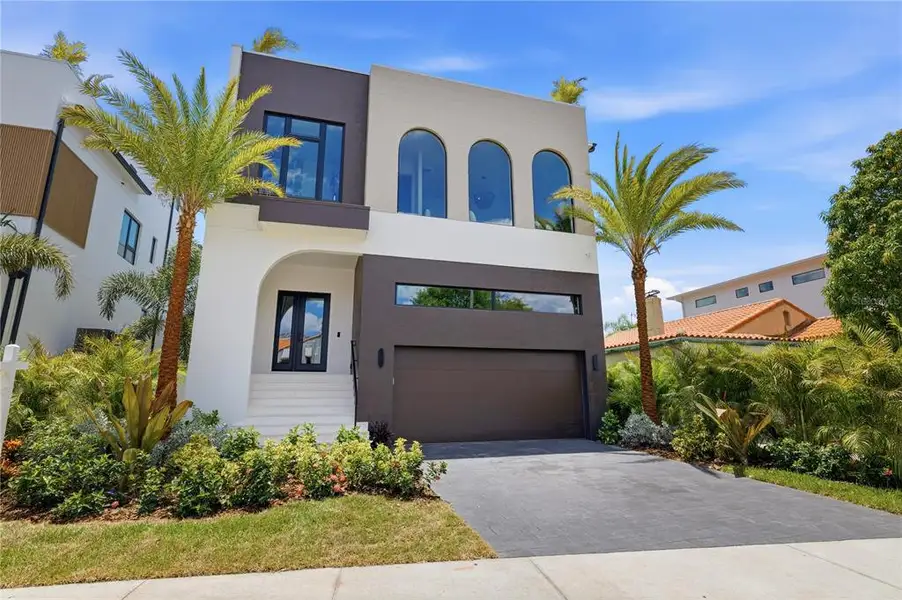 Front exterior of a new home in , Tampa, FL, highlighting curb appeal (Image 2). Front exterior of a new home in , Tampa, FL, highlighting curb appeal (Image 2).