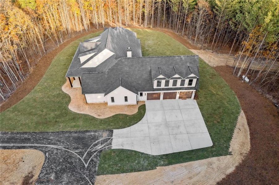Front exterior of a new home in , Dallas, GA, highlighting curb appeal (Image 29). Front exterior of a new home in , Dallas, GA, highlighting curb appeal (Image 29).