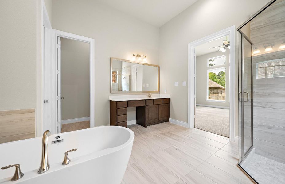 Furnished interior view inside a new home in The Woodlands Hills 65′, Willis (Image 14).