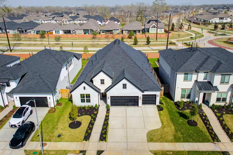 Front exterior of a new home in , Missouri City, TX, highlighting curb appeal (Image 28).