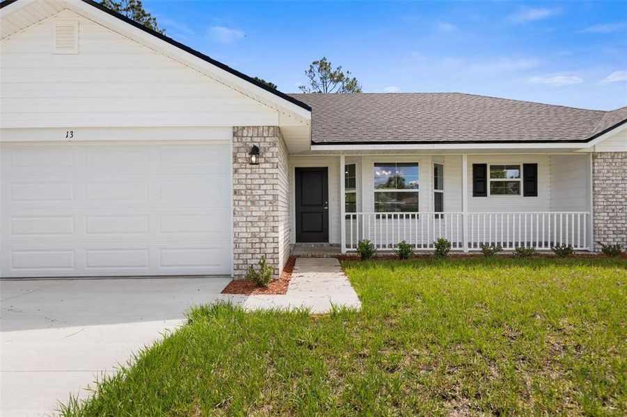 Exterior details and patio area of a home in Palm Coast, Palm Coast (Image 3). Exterior details and patio area of a home in Palm Coast, Palm Coast (Image 3).