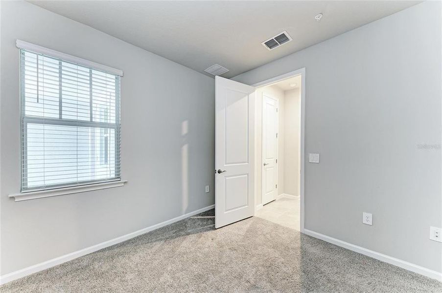 Spacious, unfurnished interior of a new home in Wellen Park, Venice (Image 38).