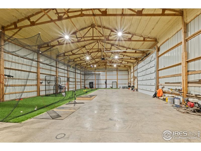 Expansive shop interior with insulated ceiling, 5-inch wire mesh, and fiber-reinforced concrete flooring-built to handle heavy use and versatile enough for equipment, storage, or recreational space
